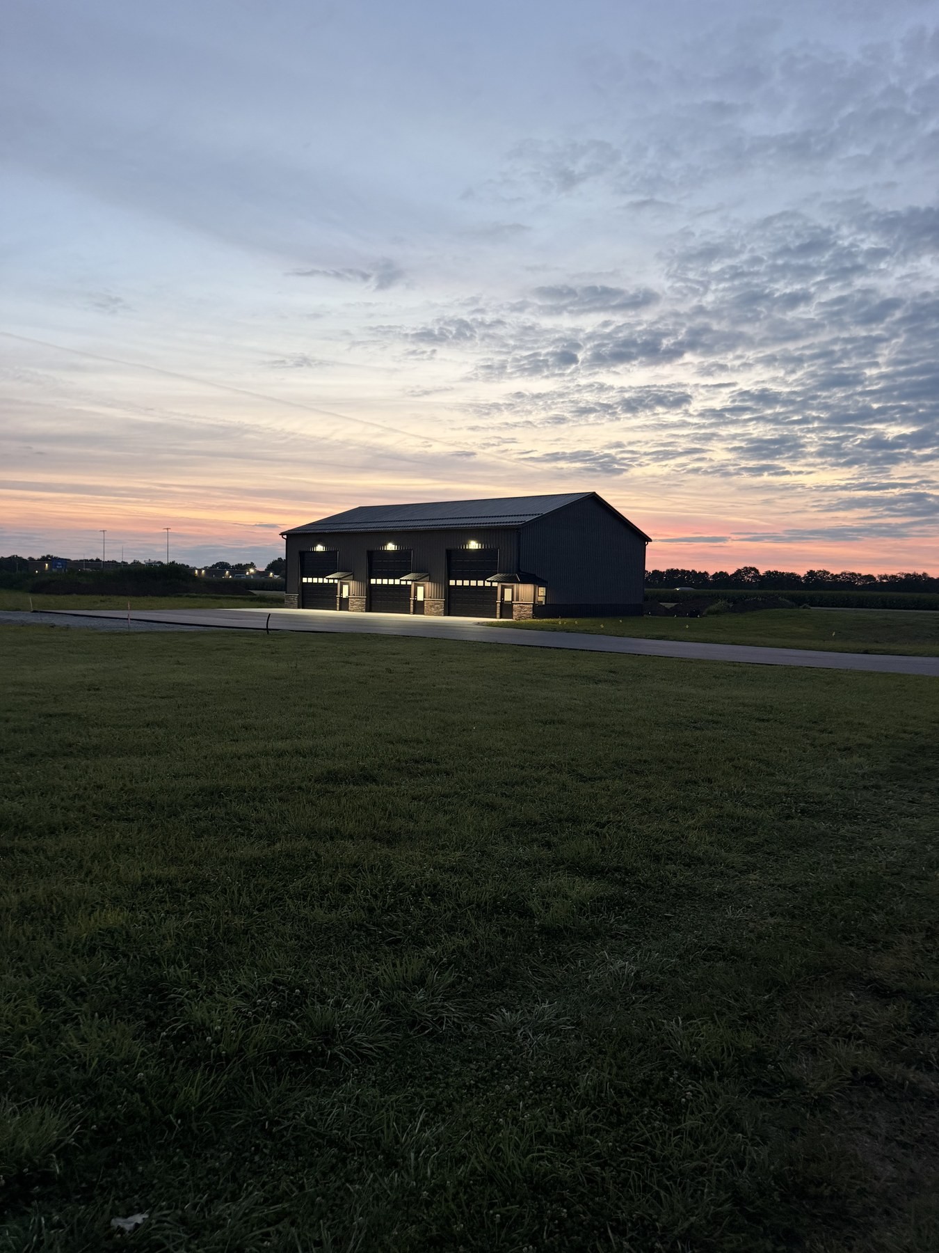 Building 1 at sunrise — The Lake Bay and sister condos at Diamond Garage Condos on Kamp Kozy