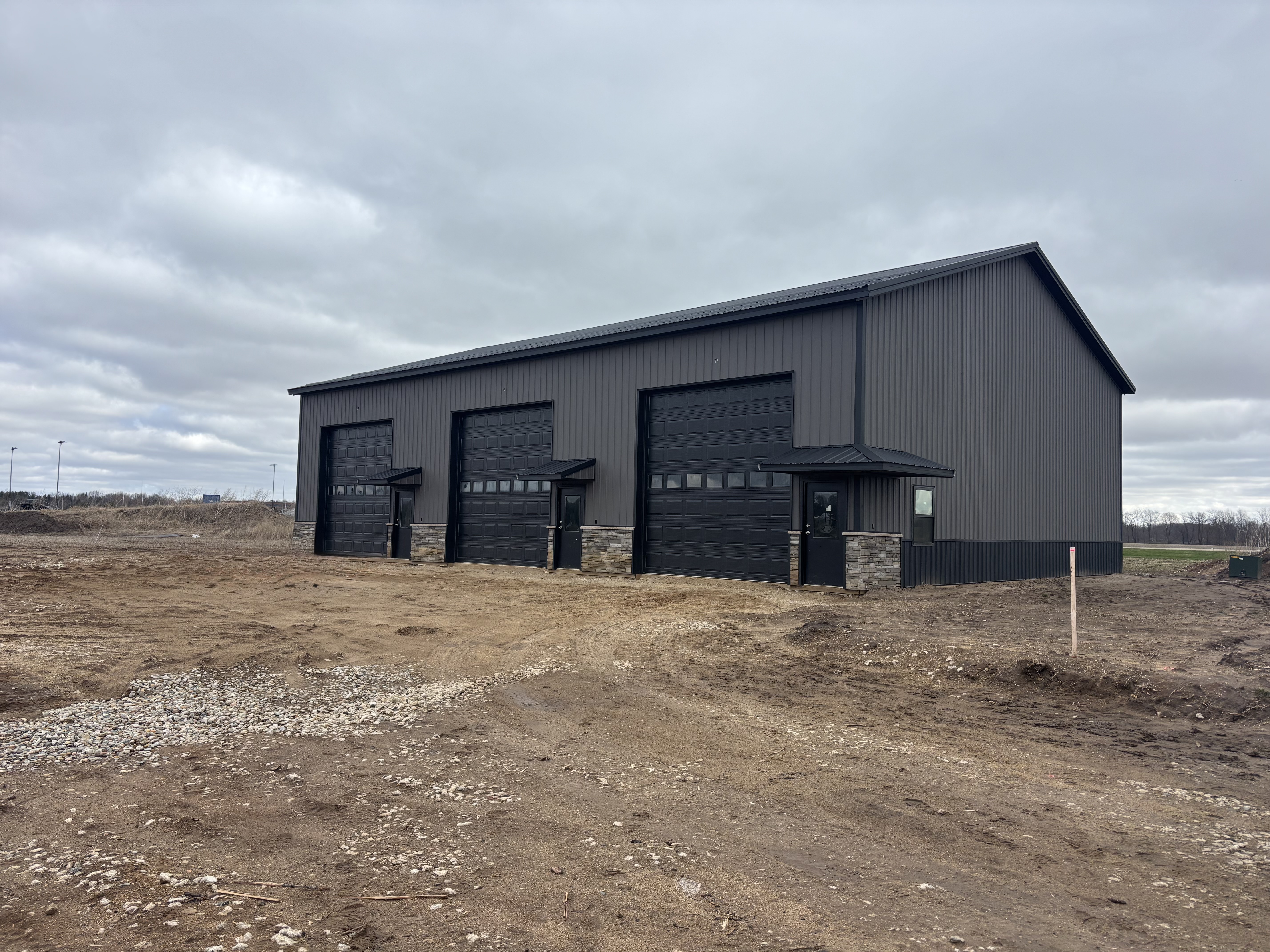 Roll-up door — 14' x 14' black garage door