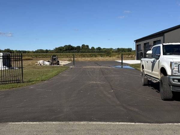 A white truck at the new entrance.